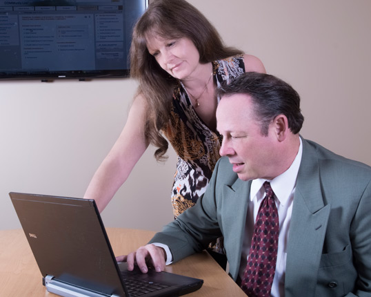 Cathie McNaughton and Mark Gallagher working together